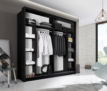 Load image into Gallery viewer, Arti AR-14 Sliding Door Wardrobe 220cm Arte-N ARTI AR-14-BM An all-in-one, exceptionally spacious wardrobe with two big sliding doors stylishly designed hles. The prominent feature of AR-14 is its gorgeous columns of mirrors at front mellow LED lights at the top. Internal structure is completely symmetrical with two identical sections, each with one large four medium-sized compartments a spacious hanging section. : W220cm x H215cm x D60cm Two Sliding Doors Mirrors Two Hanging Rails Eight Shelves LED Lightin