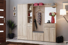 Load image into Gallery viewer, Armario Hallway Bench Arte-N DS AR TYP F + P This multipurpose cabinet + bench combo is ideal for the hallway. The two hinged doors conceal storage for shoes, boot scrapers other general items. A soft upholstered top offers a comfortable place to sit, while its timeless Oak Sonoma decor will look great in any home. W60cm x H46cm x D32cm Colour: Oak Sonoma Two Hinged Doors Shelf [Maximum 7kg Weight Limit] Matching Furniture Available Made from 16mm high-quality laminated board Assembly Required Weight: 16kg 
