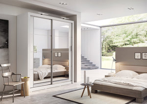 Arti AR-03 Sliding Door Wardrobe 181cm Arte-N ARTI AR-03-B A modestly-sized wardrobe with two mirrored hinged doors, decorative linings that mark the front elegant silver hles. The AR-03 is available in different colour variants – black, grey, oak white. Compatible with LED lights (not included in the purchase). Storage options include three removable shelves two large compartments.  : W181cm x H215cm x D60cm Two Sliding Doors Mirrors Two Hanging Rails Five Shelves Adjustable Interior Optional LED Lighting 