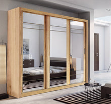 Load image into Gallery viewer, Arti AR-02 Sliding Door Wardrobe 250cm Arte-N ARTI AR-02-B The AR-02 is a brilliantly designed wardrobe with three mirrored doors aesthetic craftsmanship. It sts apart with its large, functional structure offers storage space in the form of seven compartments two exclusive hanging spaces. : W250cm x H215cm x D60cm Three Sliding Doors  Mirrors Two Hanging Rails [Additional Available To Purchase If Shelves Replaced] Six Shelves Made from 16mm high-quality laminated board  Weight: 223kg  Estimated Direct Home 