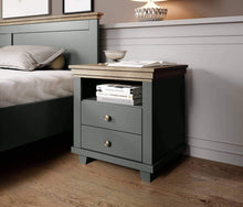 Load image into Gallery viewer, Evora 22 Bedside Table Arte-N 247DJU22 This bedside table is perfectly designed to blend in any modern or contemporary decor. With two drawers one large open compartment on top, it provides ample space to fit essential personal items for daily use. You can choose from two different colours, Oak Lefkas with green or white, so your space can reflect the rest of the design scheme perfectly. It is made from 16mm laminated board feels solid while being lightweight strong. W52cm x H54cm x D42cm Colour: Abisko Ash