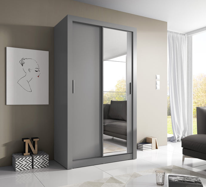 Arti 6 - 2 Sliding Door Wardrobe 120cm Arte-N ARTI AR-06-G Using minimal floor space, the Arti 6-2 is designed for small homes studio apartments. Two sliding doors are featured behind which a pair of compartments, two hanging sections three removable shelves can be found. Personalized internal arrangement is possible. The wardrobe is available in four colours – white, black, grey oak. W120cm x H215cm x D60cm Two Sliding Doors Mirror Two Hanging Rails Five Shelves Self-customised inside layout Powered LED li