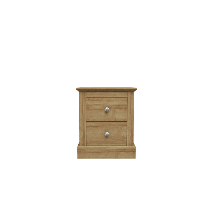 Devon Bedside Cabinet Oak LPD DEVCABOAK 5036464068640 Particle Board Colour: Oak Dimensions: 552mm x 459mm x 395mm Introducing the Devon range of furniture. This bedroom range offers a traditional design. The Devon range comes in three stunning finishes. Oak/white, oak/charcoal and oak. This extensive range offers a timeless elegance to any home and at an extremely affordable price.
