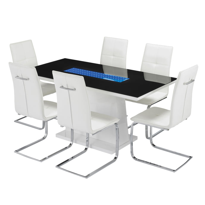 Matrix Dining Table White LPD MATRIX* 5036464053950 Colour: White Dimensions: 760mm x 1600mm x 800mm For a truly futuristic look, the Matrix Dining Table features a white high-gloss stand and surround in place of traditional legs, finished with a sleek black glass top that is inset with blue LEDs. Ideal for minimalists who want clean lines with a bit of a twist, this collection gives a stunning infinity effect that has left nothing to chance, with the LEDs being operated using batteries and leaving no unsig