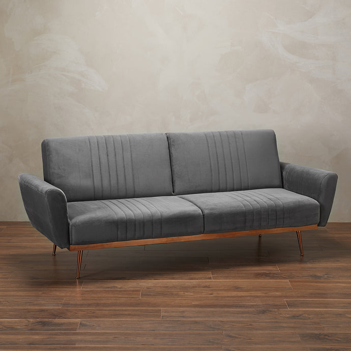Nico Grey Sofa Bed LPD NICOGREY* 5036464072203 Colour: Grey Dimensions: 850mm x 2100mm x 830mm Luxury at its finest, the Nico sofa is practical yet stylish. With eye-catching, beautiful cooper effect base and legs, the lavish velvet reflects against this to provide a plush comfy seating area. This is a great asset to have in your home as it is easy and ready to transfer into space for your guests to sleep!