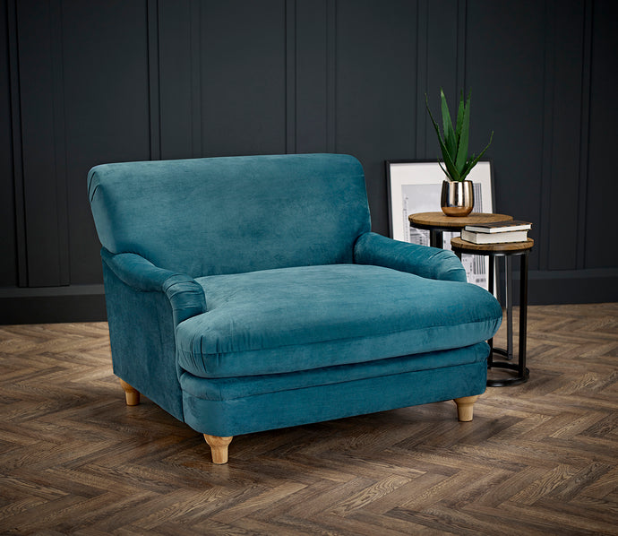 Plumpton Chair Peacock Blue LPD PLUMPBLUE 5036464071565 Velvet Colour: Peacock Blue Dimensions: 840mm x 1060mm x 1090mm Available in 6 different colours, this comfy chair is a chic addition to your home. With a wide cushioned seat and upholstered in soft velvet material, the Plumpton is an ideal place to relax. Luxurious yet cosy, this will be a perfect addition to your living area.