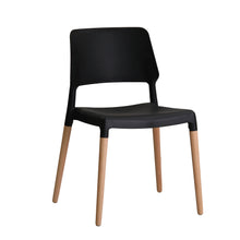 Load image into Gallery viewer, Riva Chair Black (Pack of 2) LPD RIVABLACK 5036464056692 Plastic,Wood Colour: Black Dimensions: 810mm x 550mm x 540mm The Riva Chair is characterised by its minimal design that creates a unique and light shape. A chair that will exalt the characteristics of your home, the black moulded seat with openwork back sits elegantly on rounded beech legs. Less is more with this fabulously simple, yet wonderfully beautiful chair. 
