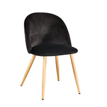 Load image into Gallery viewer, Venice Dining Chairs Black (PK 2) LPD VENICECHABLA 5036464065540 Colour: Black Dimensions: 780mm x 510mm x 550mm Available in packs of two and made from black velvet, the Venice stands on metal legs with oak effect which beautifully contrast the glamourous deep coloured seat. The plush fabric will add comfort and sophistication to your dining set and will happily match all modern interior in your home.