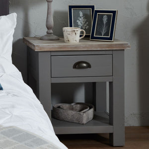 The Oxley Collection Side Table in GREY Hill Interiors 22526 5050140252680 Timeless and durable Versatile colourway Handcrafted Dimensions: 60cm x 55cm x 40cm Weight: 15kg Volume: 0.16CBM The Oxley Collection Side Table boasts a useful drawer and shelf. Perfect for keeping its washed wood surface clutter free and providing the space required for a table lamp and other items. Stylish as well as functional, this side table would be equally at home in a living room as beside a bed, as a nightstand.

This item 