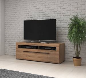 Tulsa 41 TV Cabinet 140cm Arte-N 2497FJ41 Give your living room or bedroom an understatedly elegant look with this functional TV cabinet. It offers one large double-drawer, as well as an open compartment for storage, is available in two different colours – white gloss Oak Grson. It is crafted from 16mm laminated board, offering both good looks practicality. W140cm x H52cm x D50cm Colour: Front: White Gloss Carcass: White Matt Oak Grson Powered LED lighting is included Matching furniture available Made from 