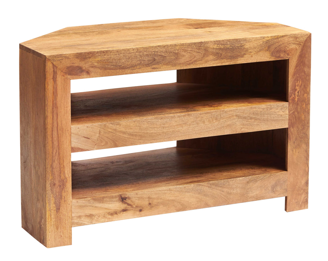 TOKO LIGHT MANGO CORNER TV UNIT Indian Hub LM26 5051132947102 Dimensions: 65cm x 100cm x 54cm (Height x Width x Depth) Solid Mango Wood Fully Assembled Eco Friendly wood used Matching Wooden Handles White glove delivery Made in INDIA The Toko Light Mango is a fabulous collection of contemporary mango furniture made from solid mango hardwood obtained from sustainable sources which is lightly stained and accompanied with a matt finish having simple clean lines to give a natural warm look and maintain the wood